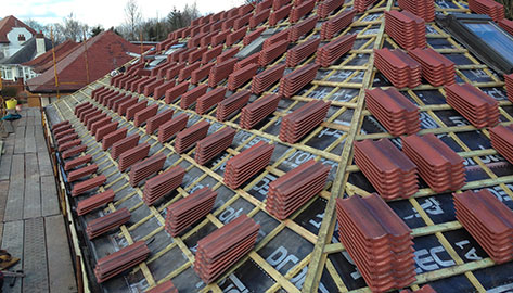 Réparation et rénovation de toiture à Rueil-Malmaison (92500) dans les Hauts-de-Seine (92).